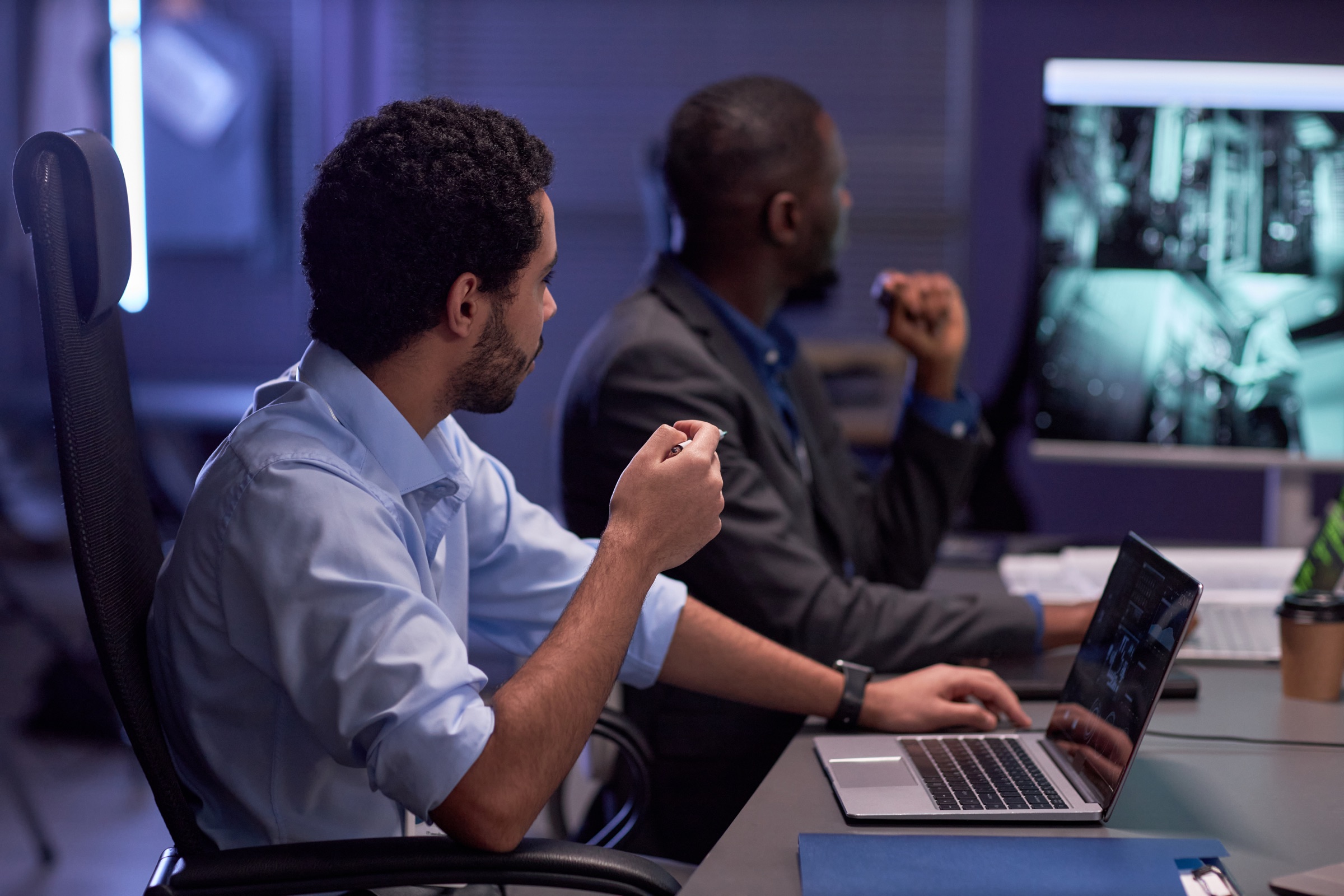 An IT team reviewing warehouse system access and controls