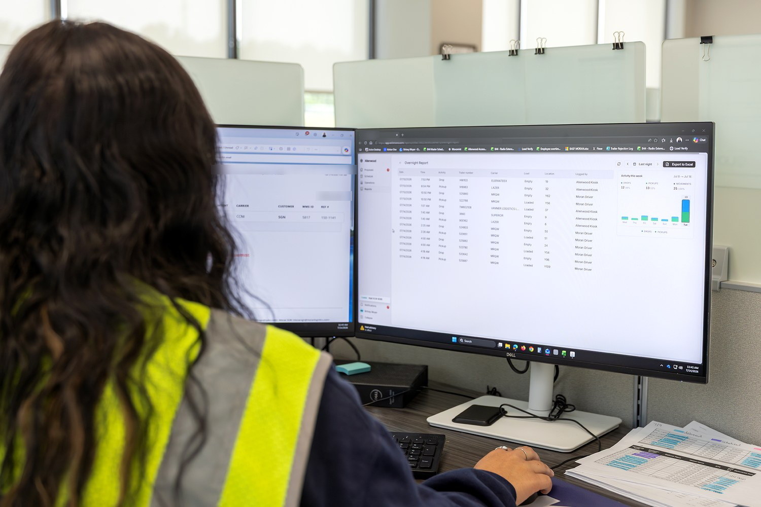 An operator reading the Movo overnight report at a desk first thing in the morning